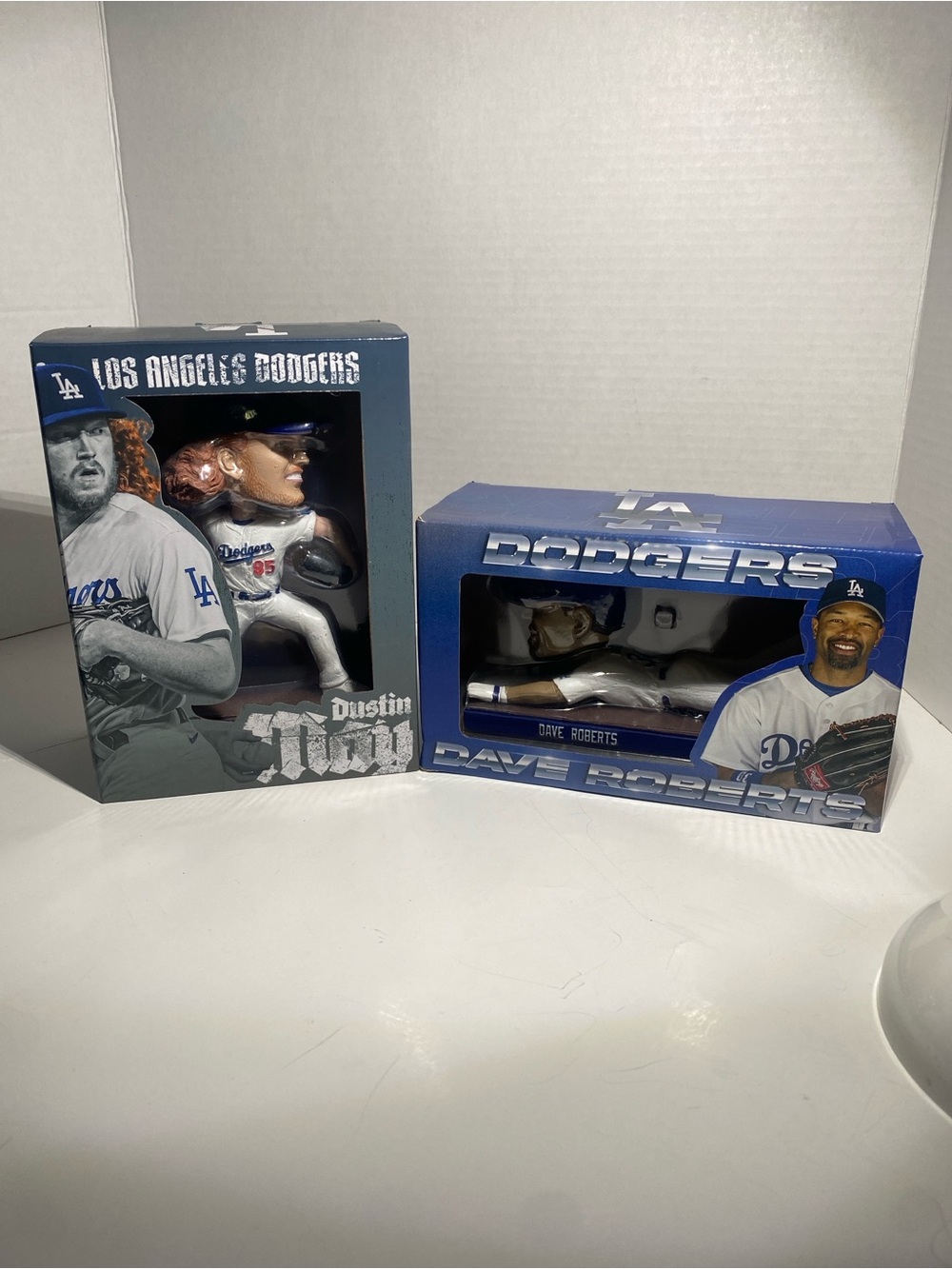 Dave Roberts and Dustin May bobble heads